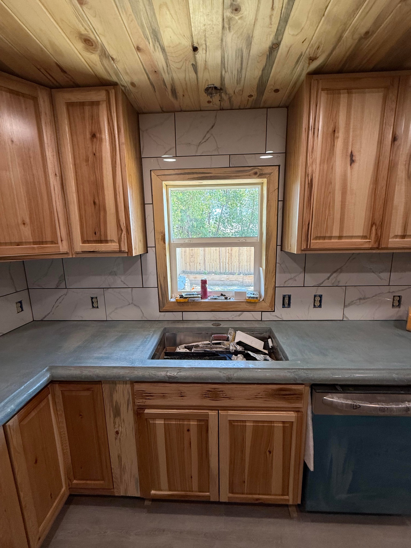 Custom kitchen remodel with hickory cabinets and tile backsplash Miles City MT