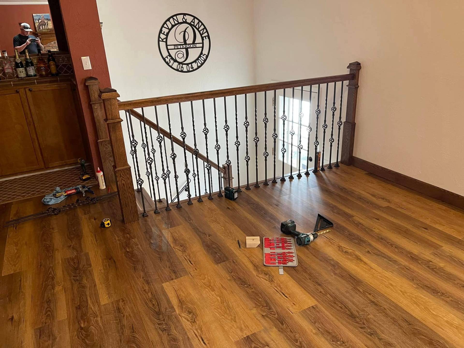 Luxury vinyl plank flooring and wrought iron railing Miles City MT